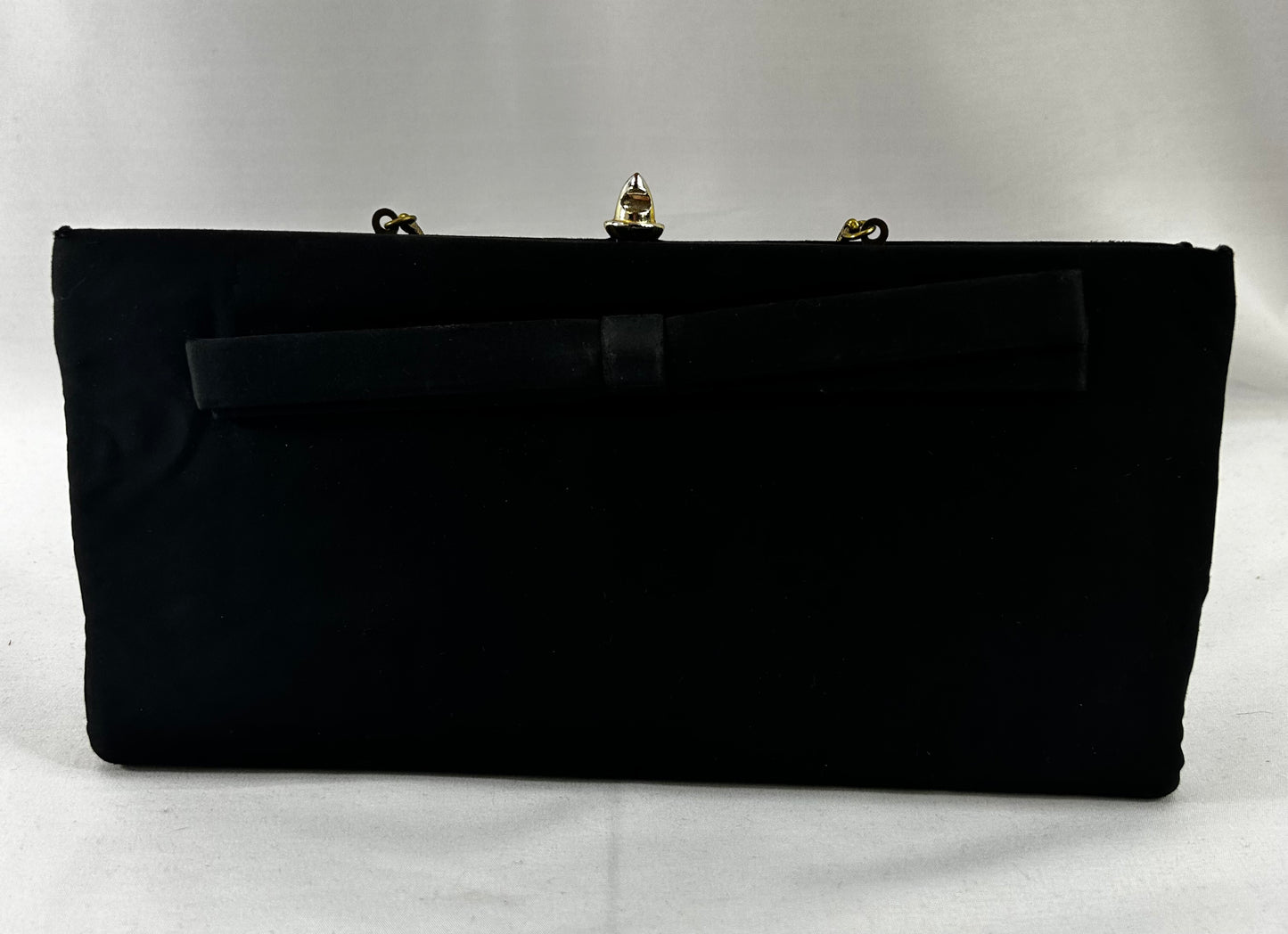 Black fabric clutch with bow