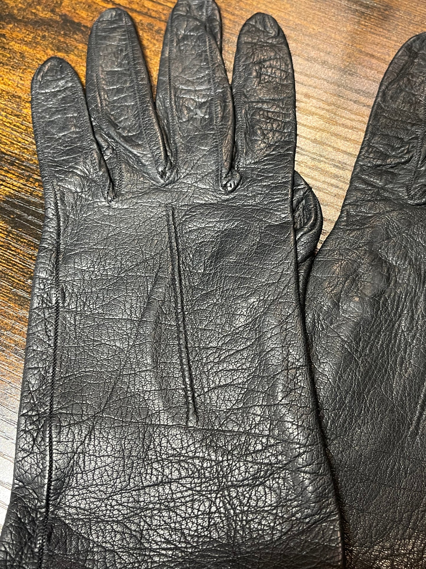 Black leather gloves