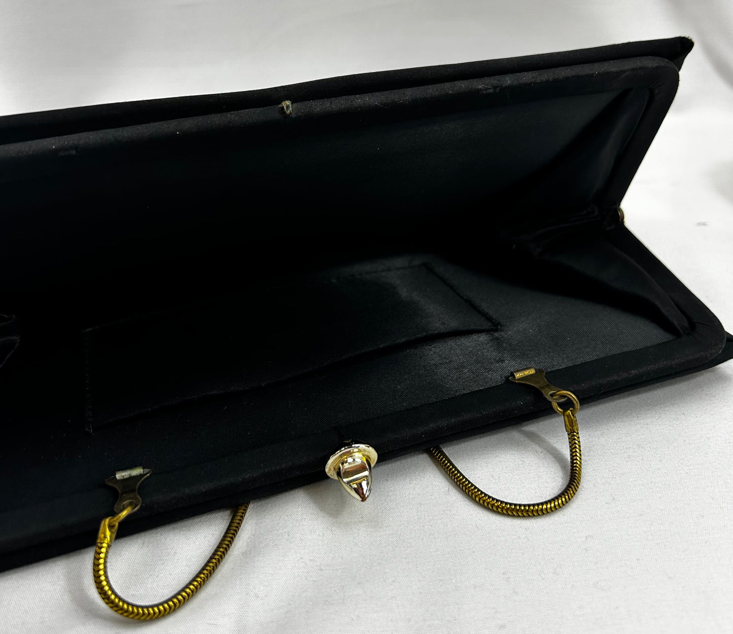 Black fabric clutch with bow