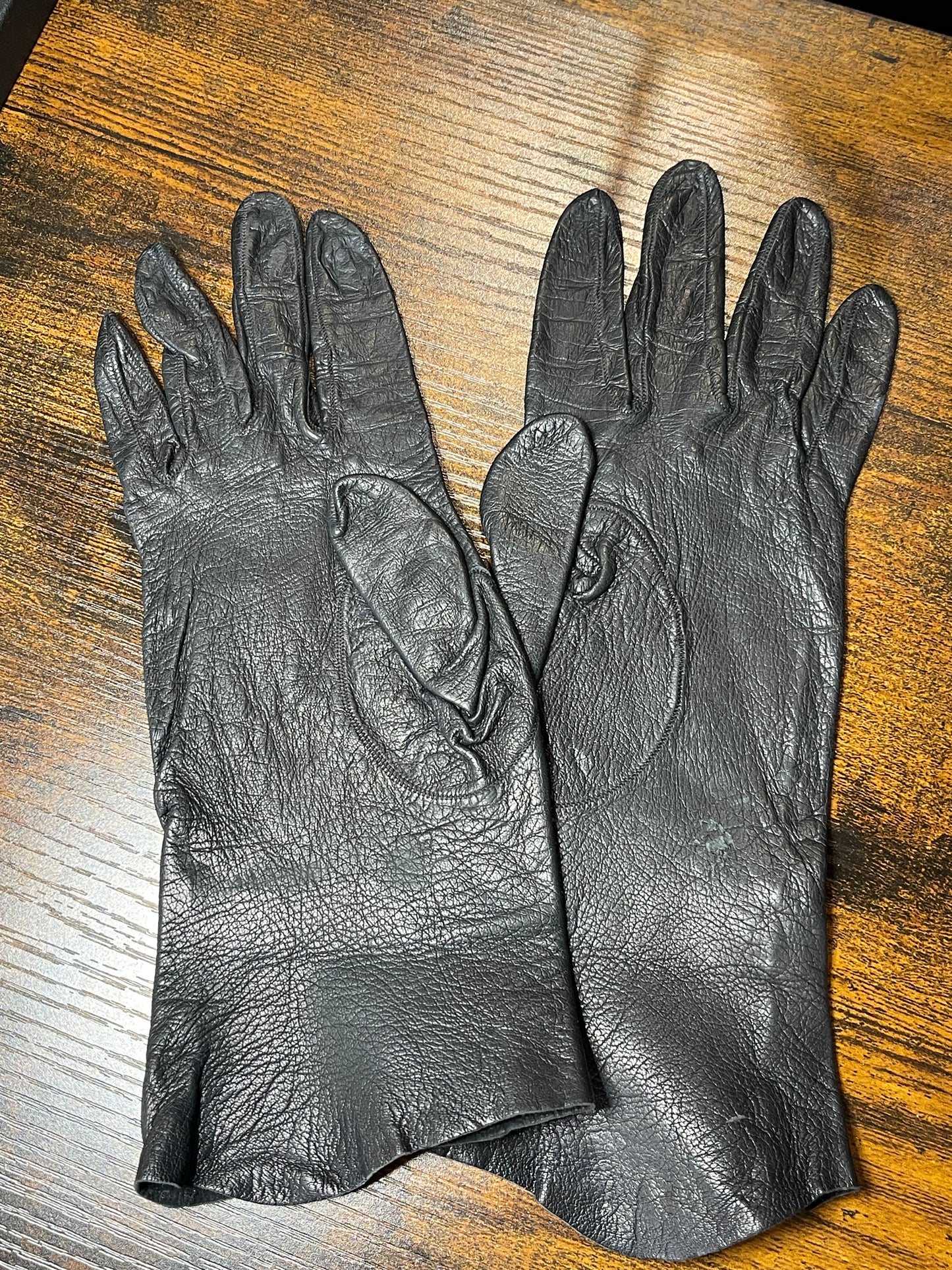Black leather gloves