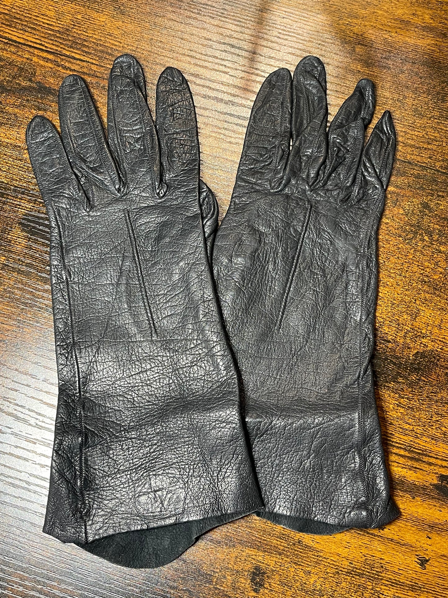 Black leather gloves