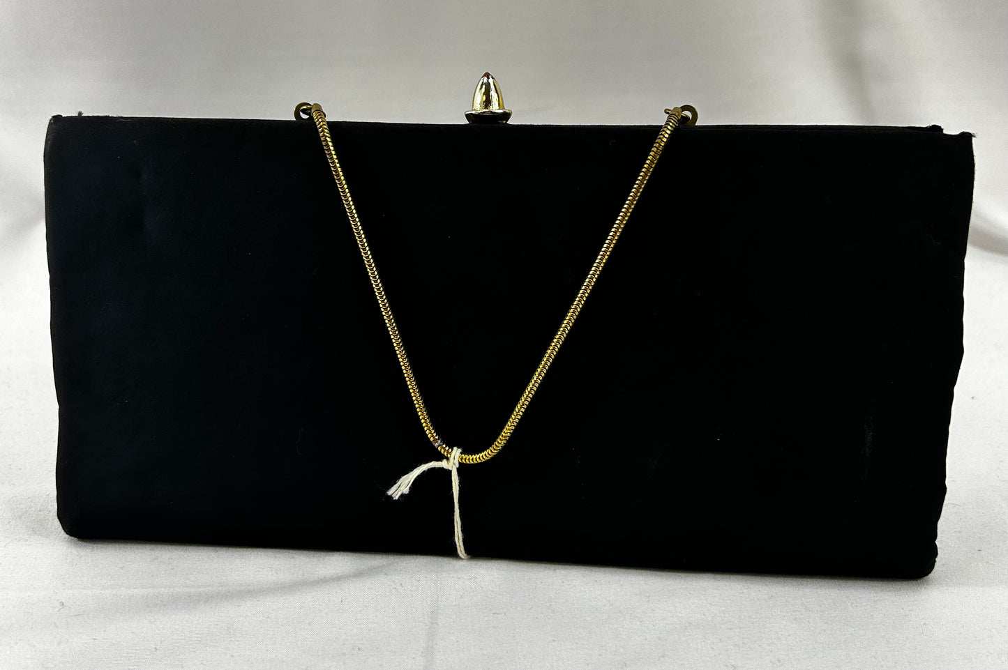 Black fabric clutch with bow