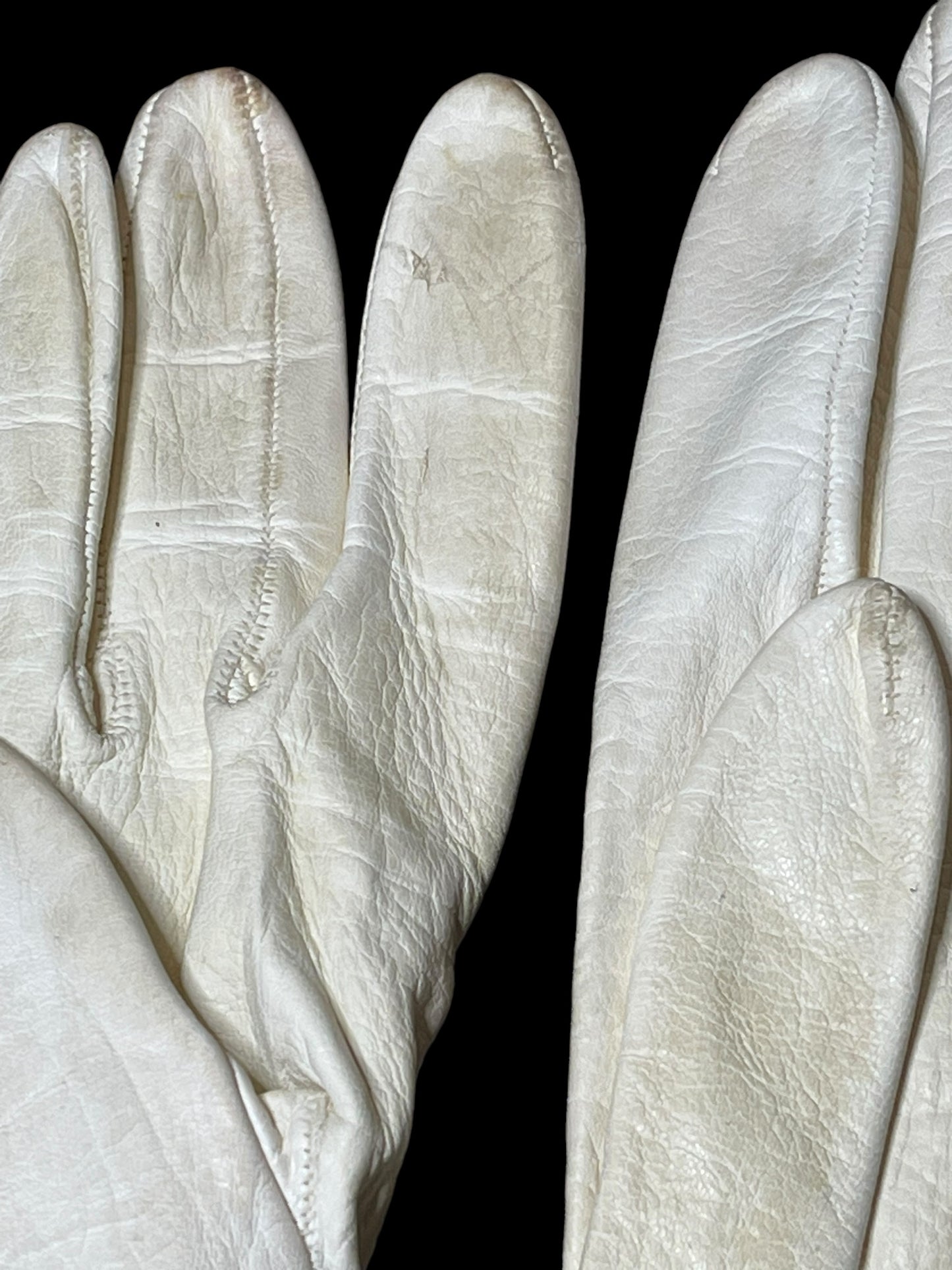 White leather gloves with cutout