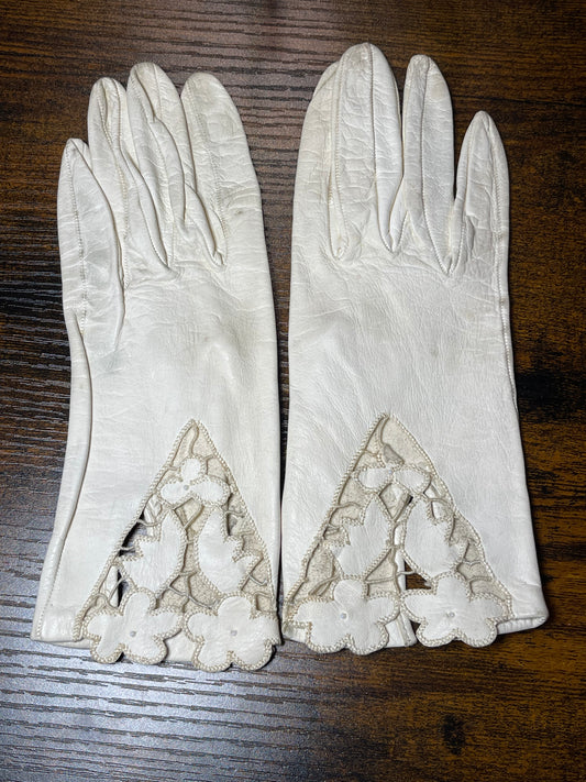White leather gloves with floral cutout at wrist