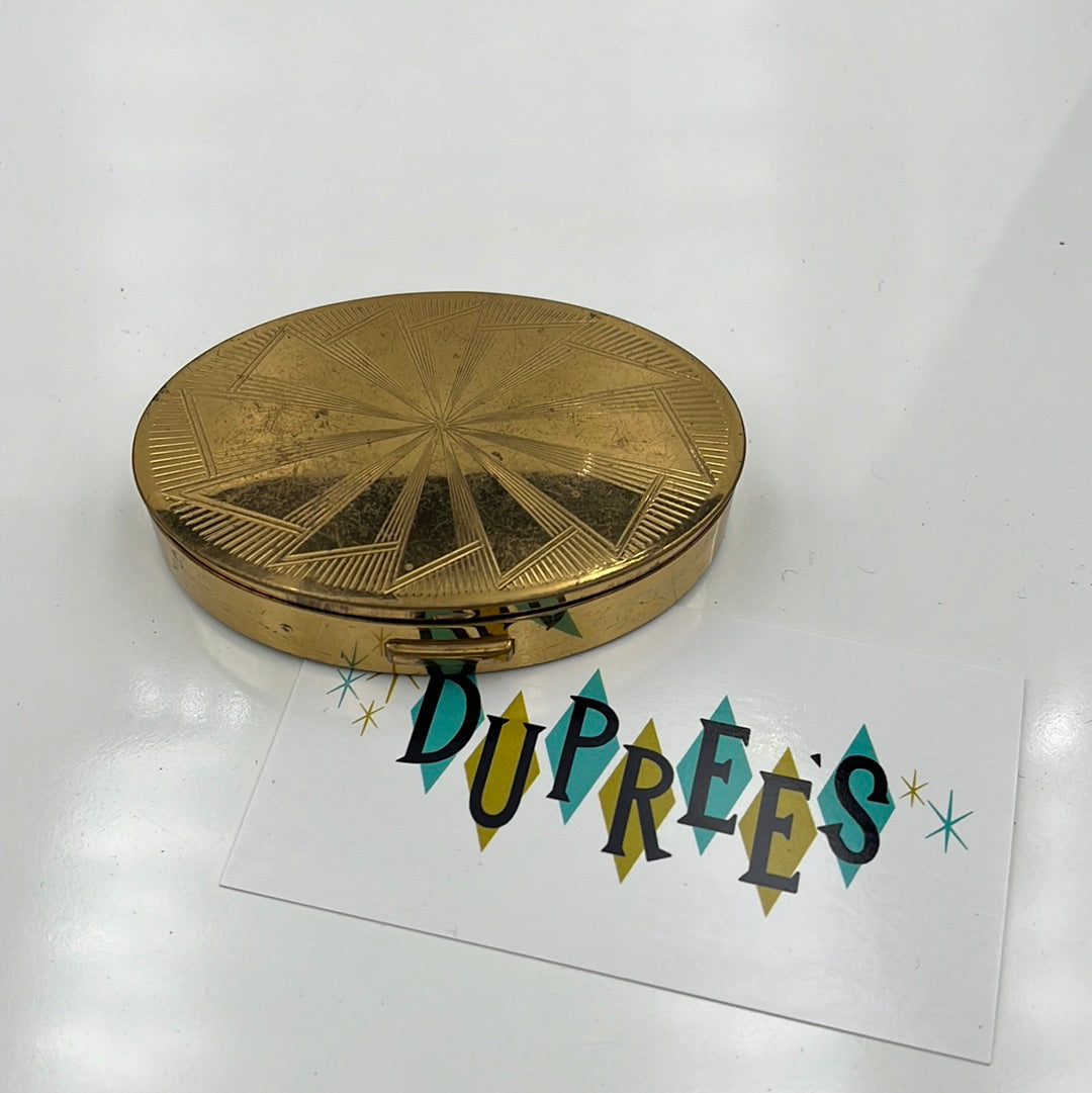 Oval mirrored makeup compact