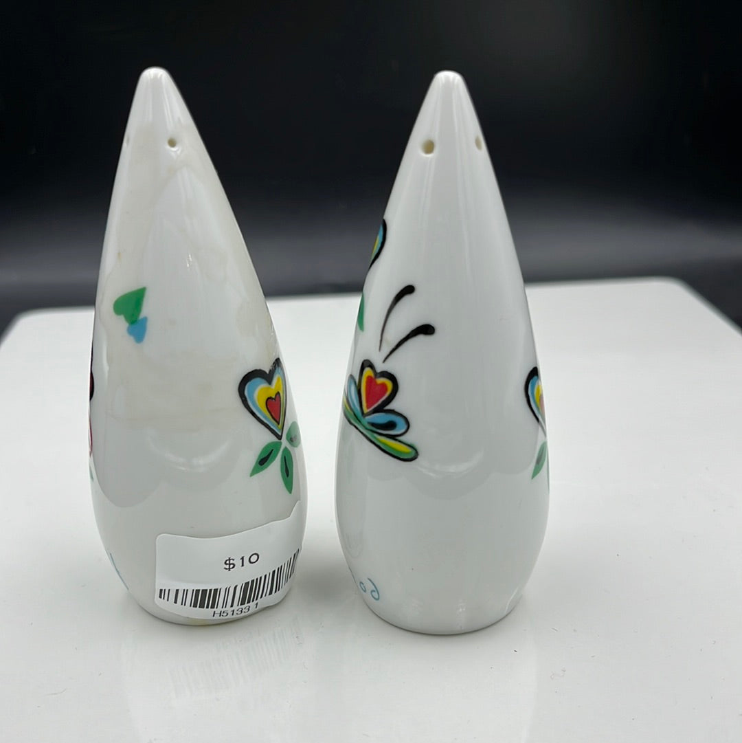 White cone shaped salt and pepper shakers