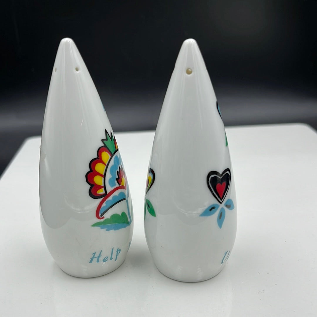 White cone shaped salt and pepper shakers