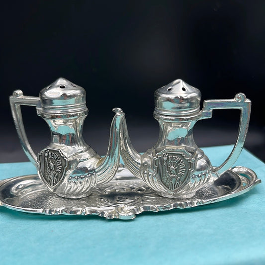Silver teapot and tray salt and pepper shakers