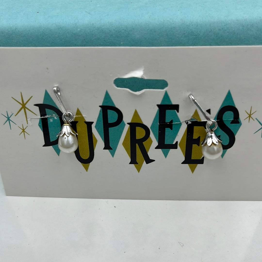 Silver and faux pearl clip on earring