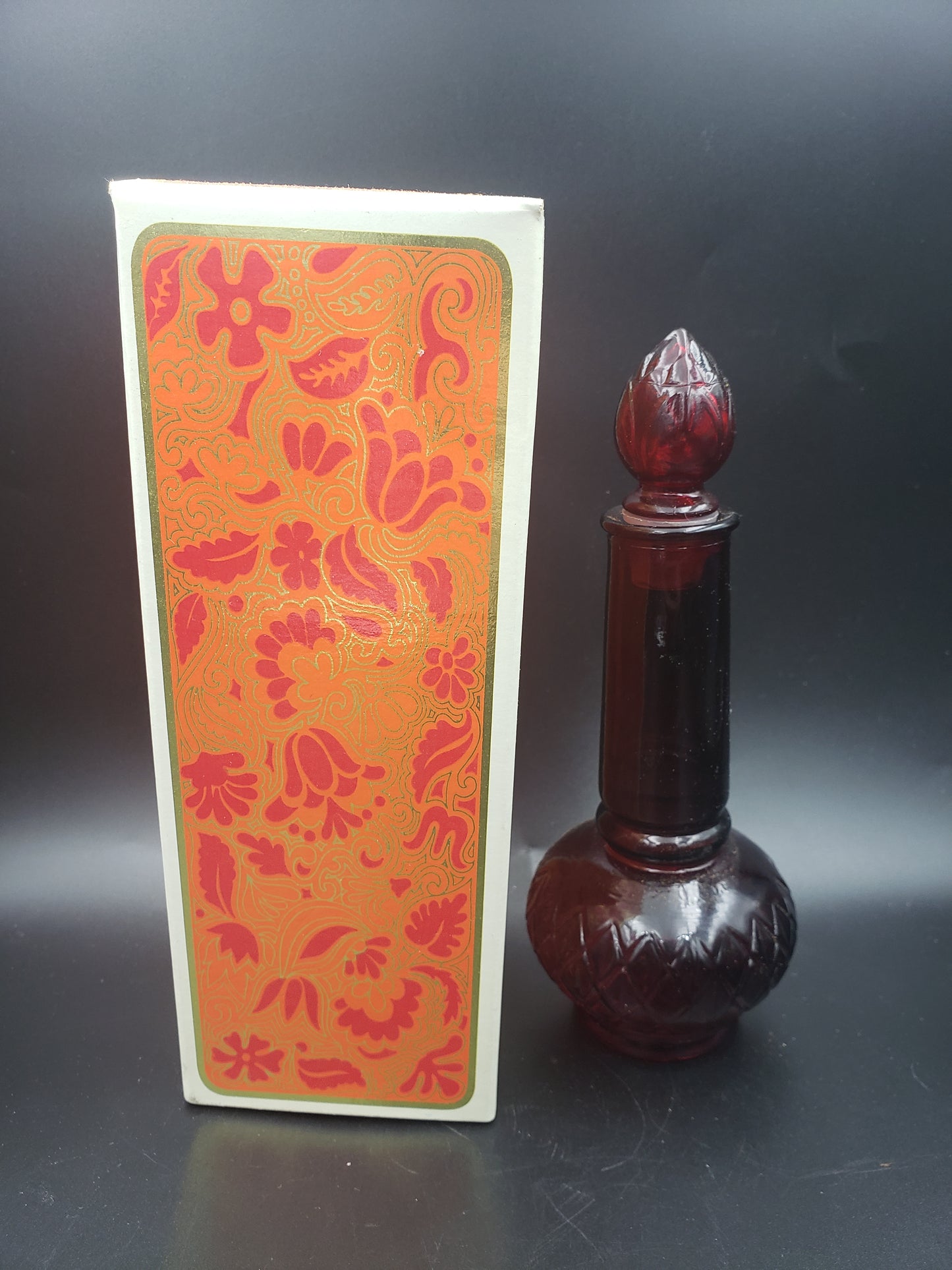 Vintage Avon Garnet Bud Base cologne bottle.