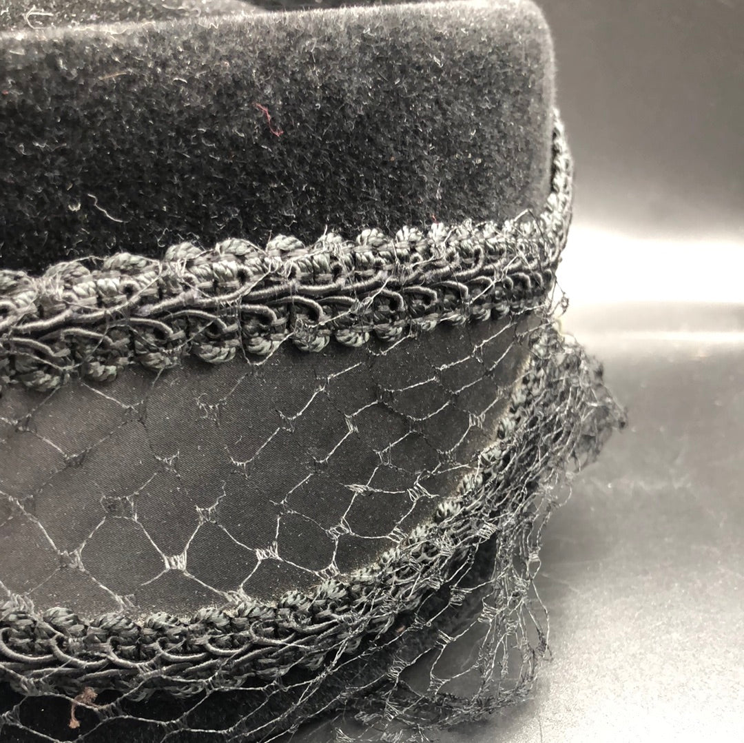 Black velvet hat with brim detail and black net