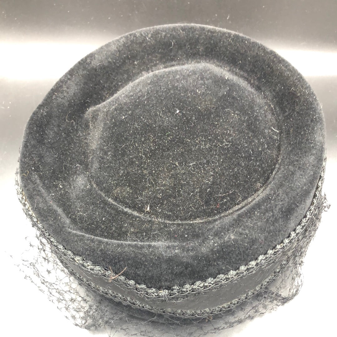 Black velvet hat with brim detail and black net