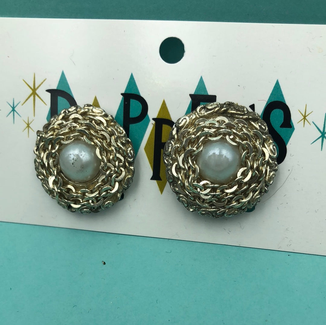 White faux pearl center with silver chain surround clip on earring