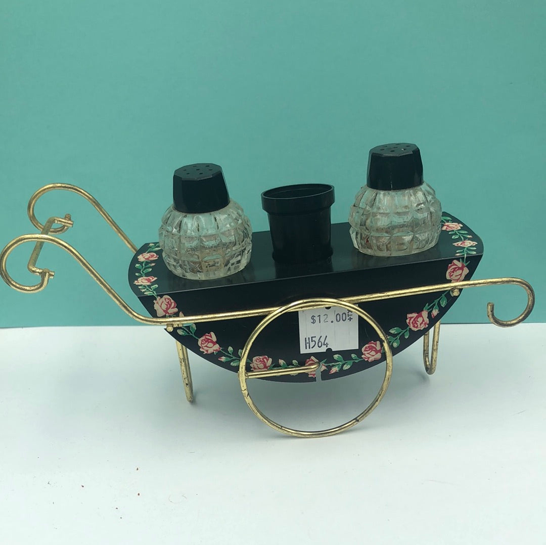 Black cart salt and pepper shaker with toothpick holder