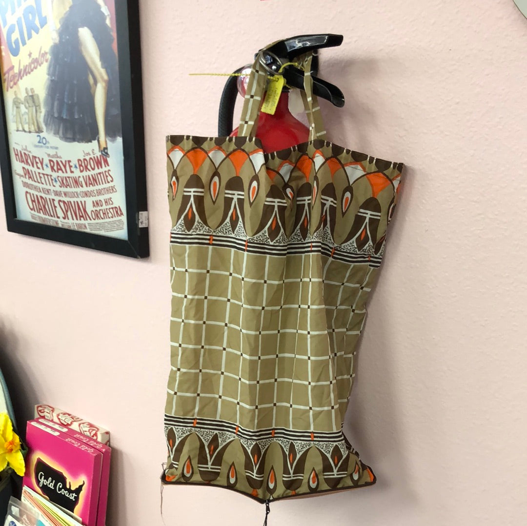 Brown zipper pouch with reusable bag