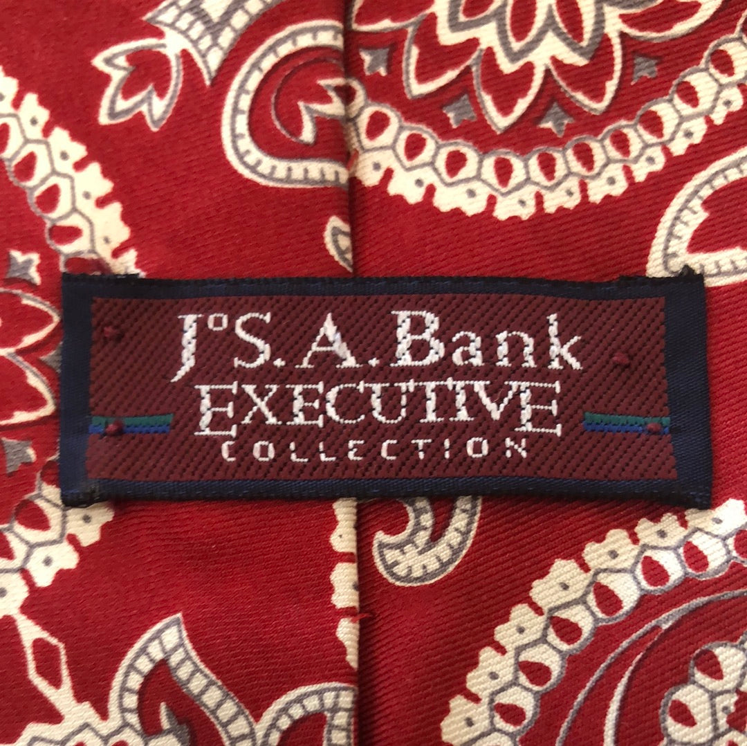 Red tie with large paisley design