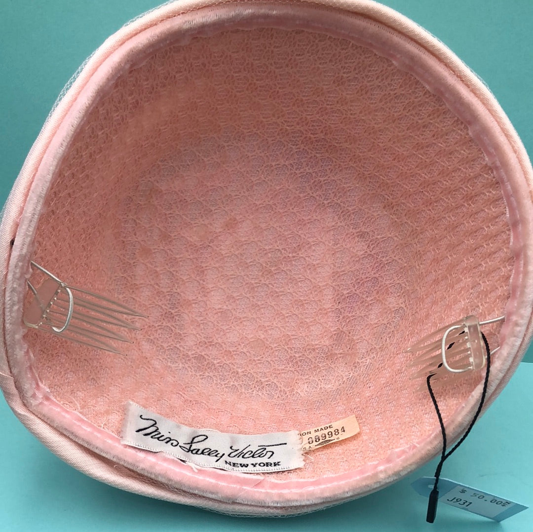 Pink fabric and tulle hat with combs