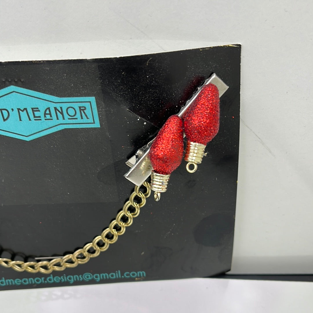 Red glittery vintage bulb sweater clip