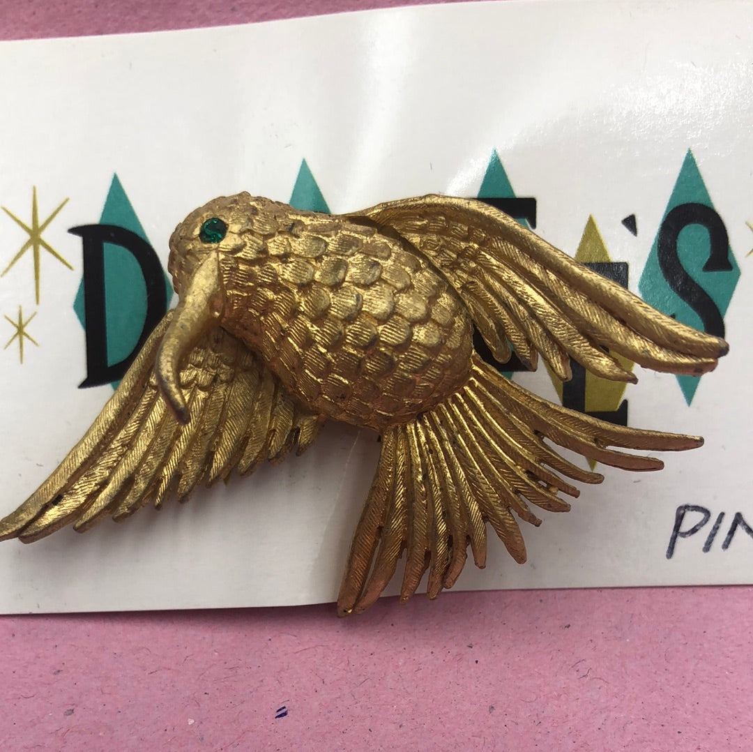 Gold hummingbird brooch