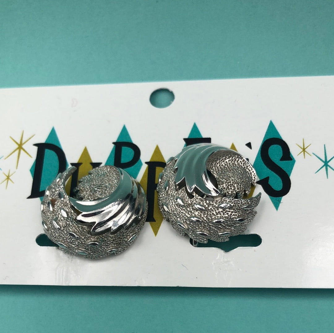 Silver Trifari round clip on earrings