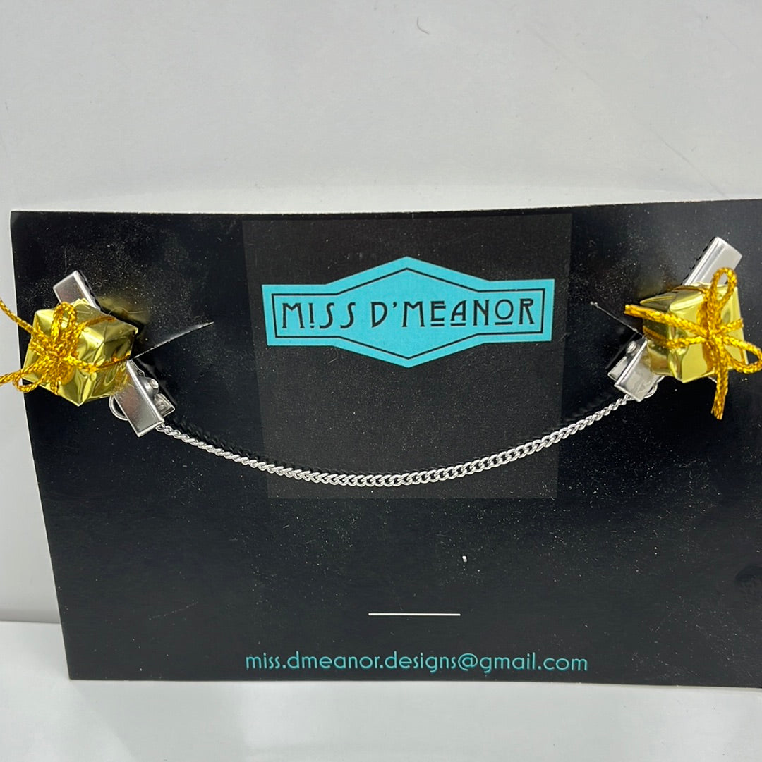 Gold present sweater clip