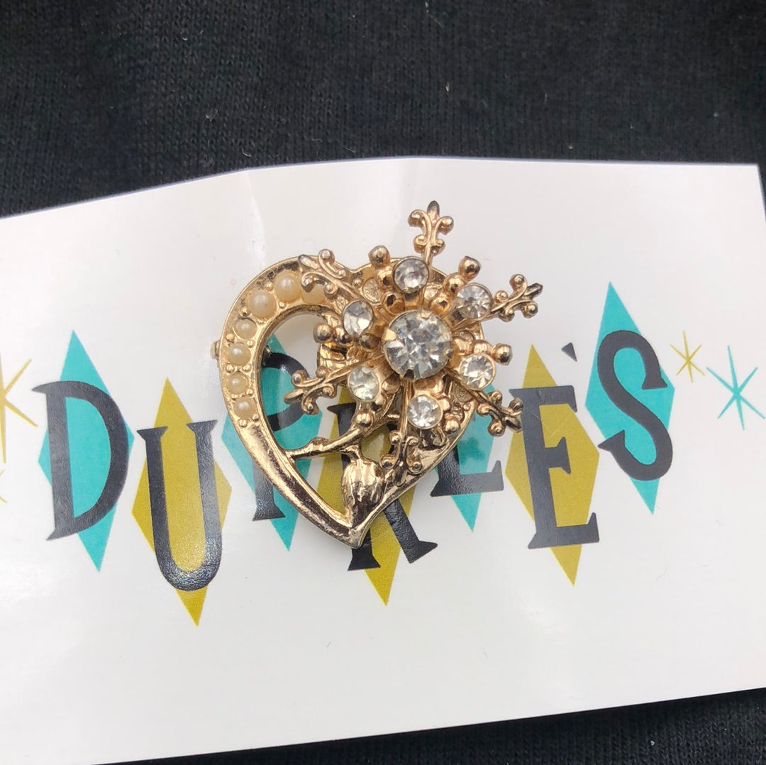 Small gold heart pin with snowflake