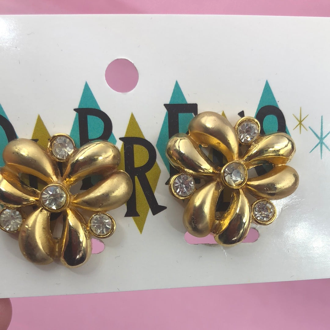 Gold free form clip on with clear crystal