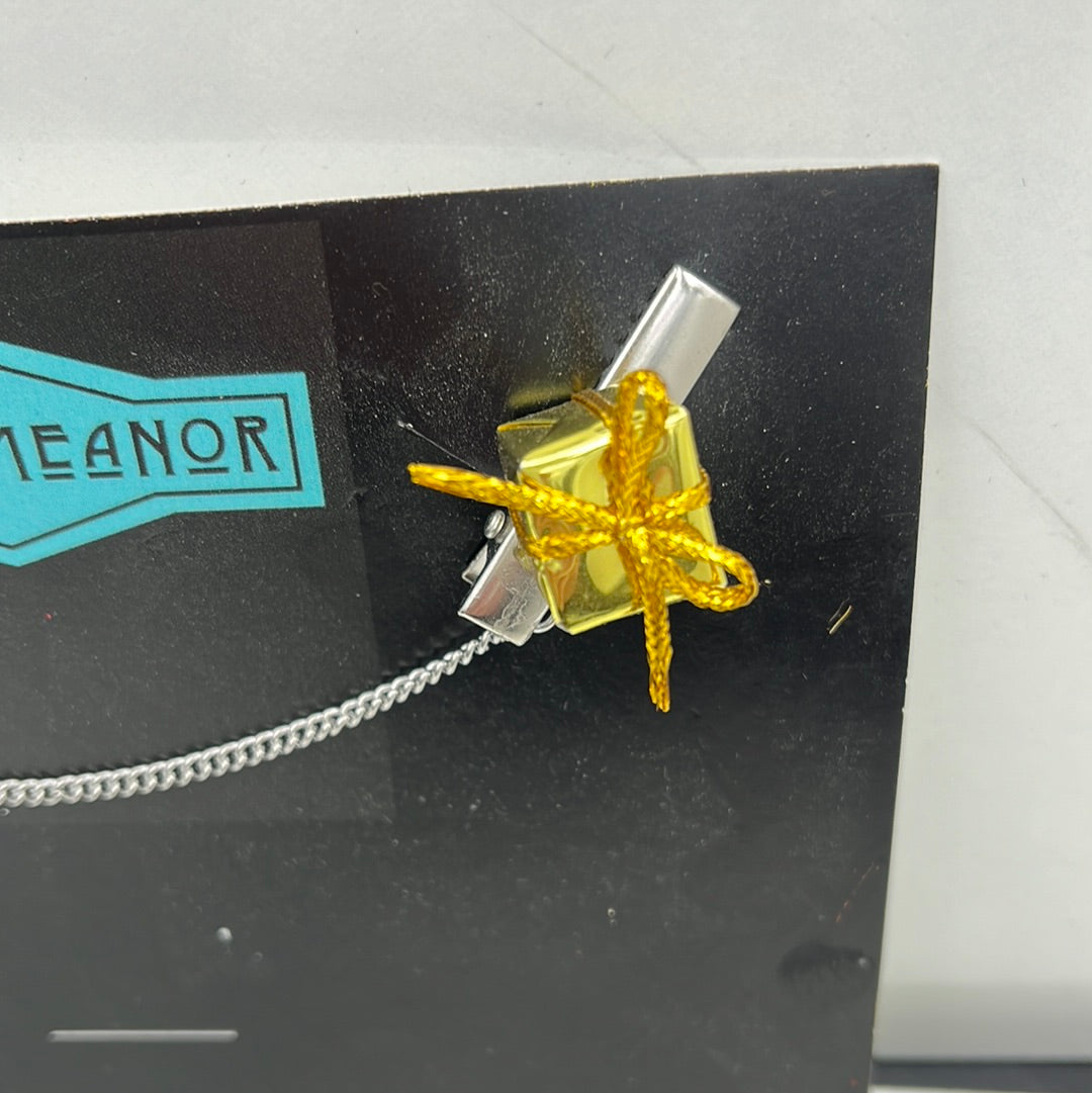 Gold present sweater clip