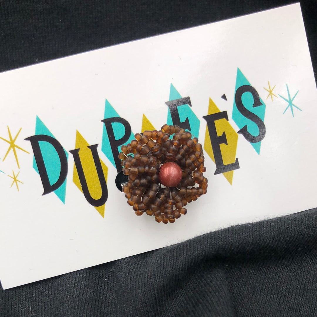 Brown bead flower pin