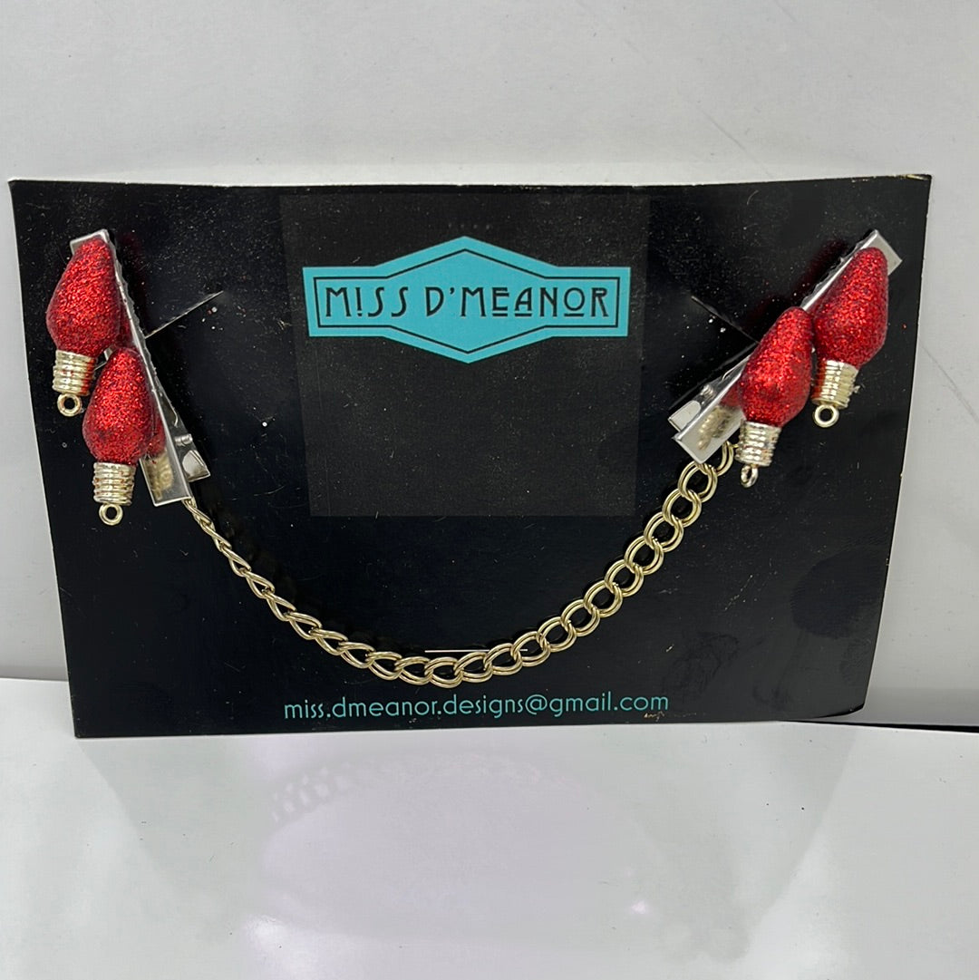 Red glittery vintage bulb sweater clip