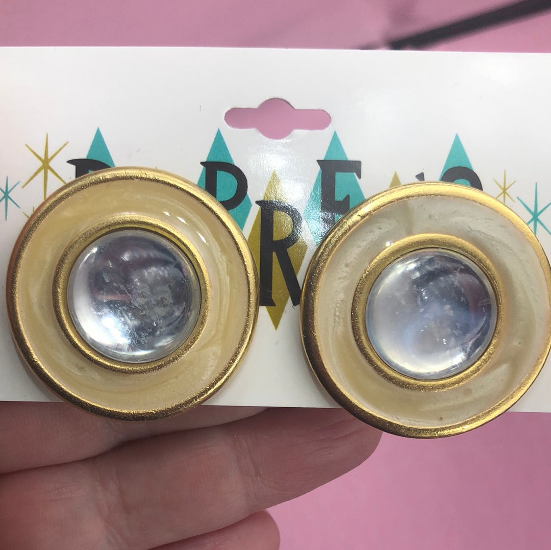 Gold circle clip on earring with silver ball center clip on