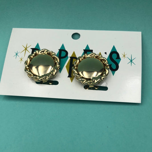 Gold coin clip on earring with braided edge