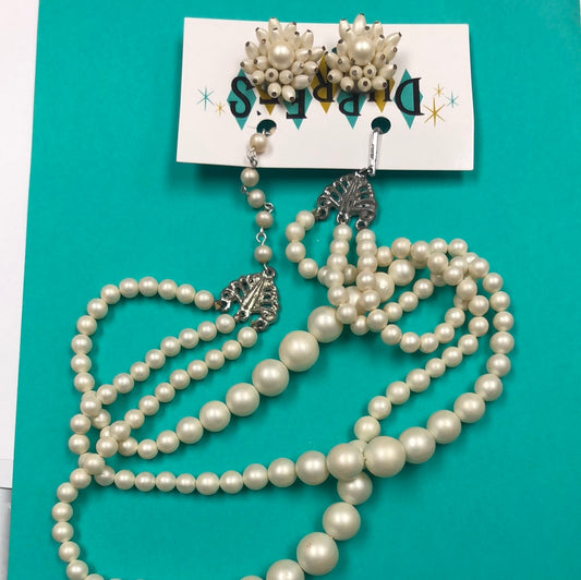 White faux pearl triple strand with matching clip on earrings