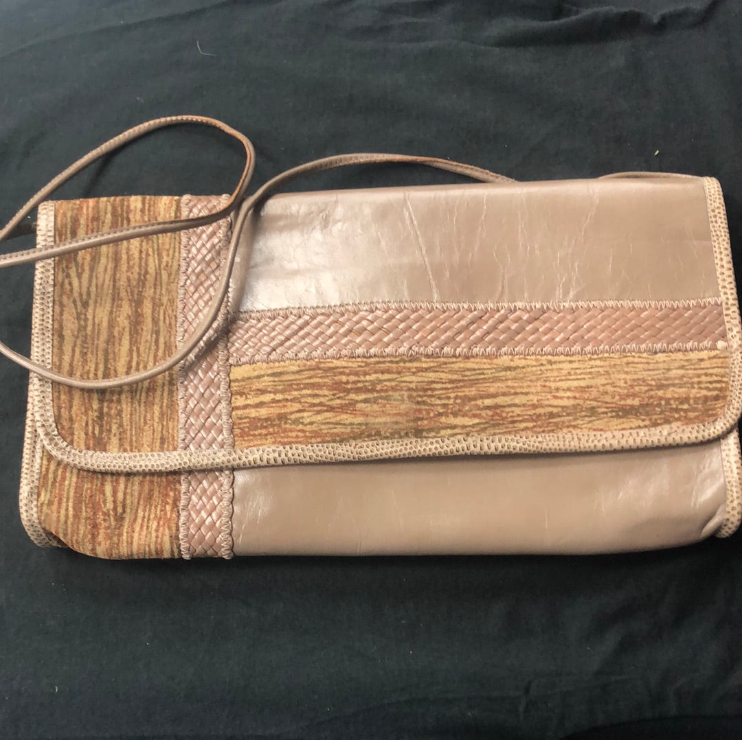 Brown patchwork flat purse with shoulder strap