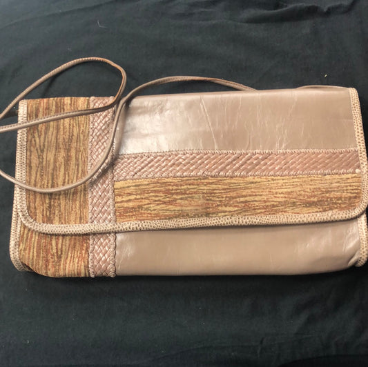 Brown patchwork flat purse with shoulder strap