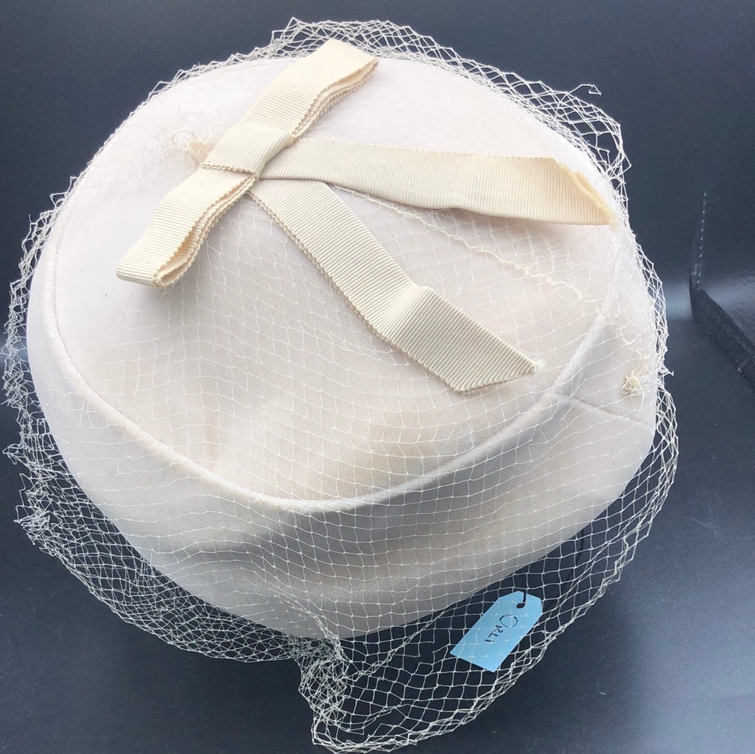 Taupe velvet hat with veil and gro grain ribbon bow on top