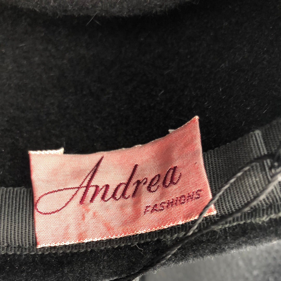 Black velvet hat with brim detail and black net