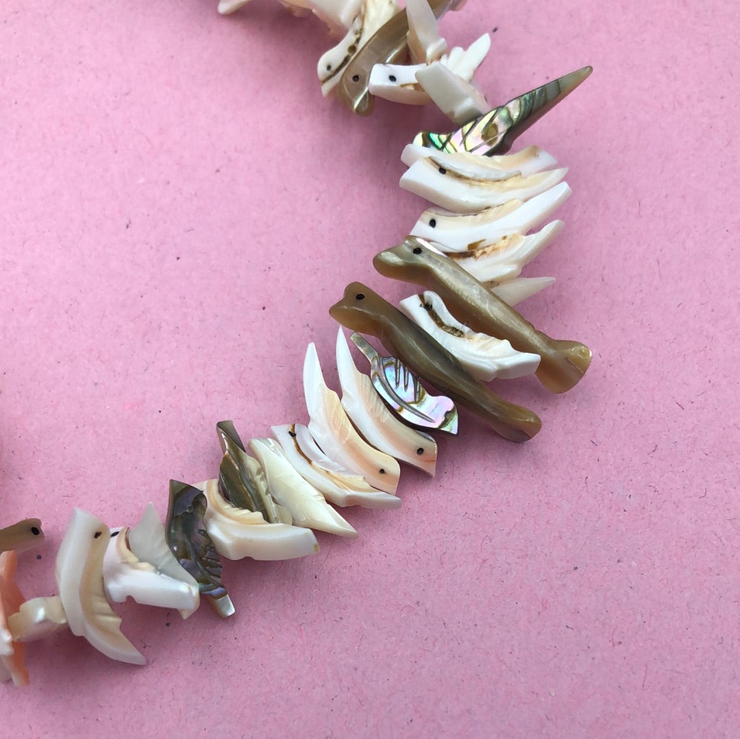 Bird carved Puka Shell necklace