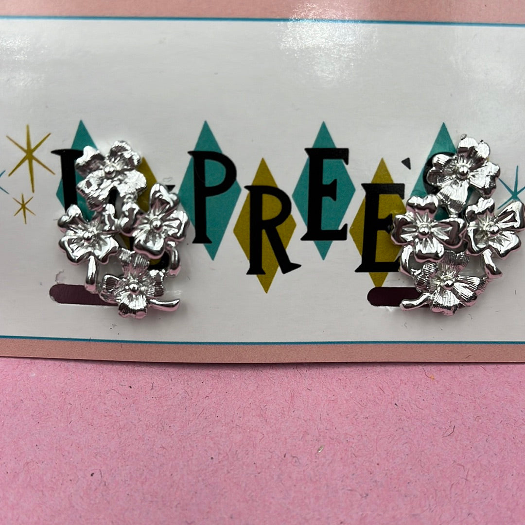 Cluster of Silver florettes clip on earring