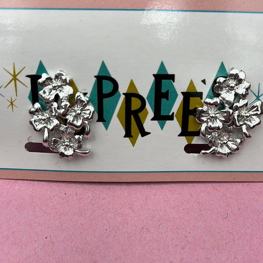 Cluster of Silver florettes clip on earring