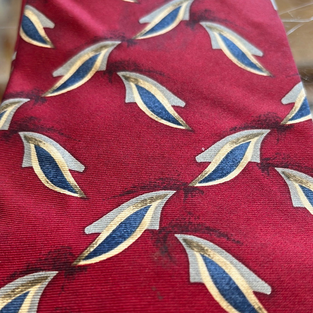 Red tie with diagonal pattern