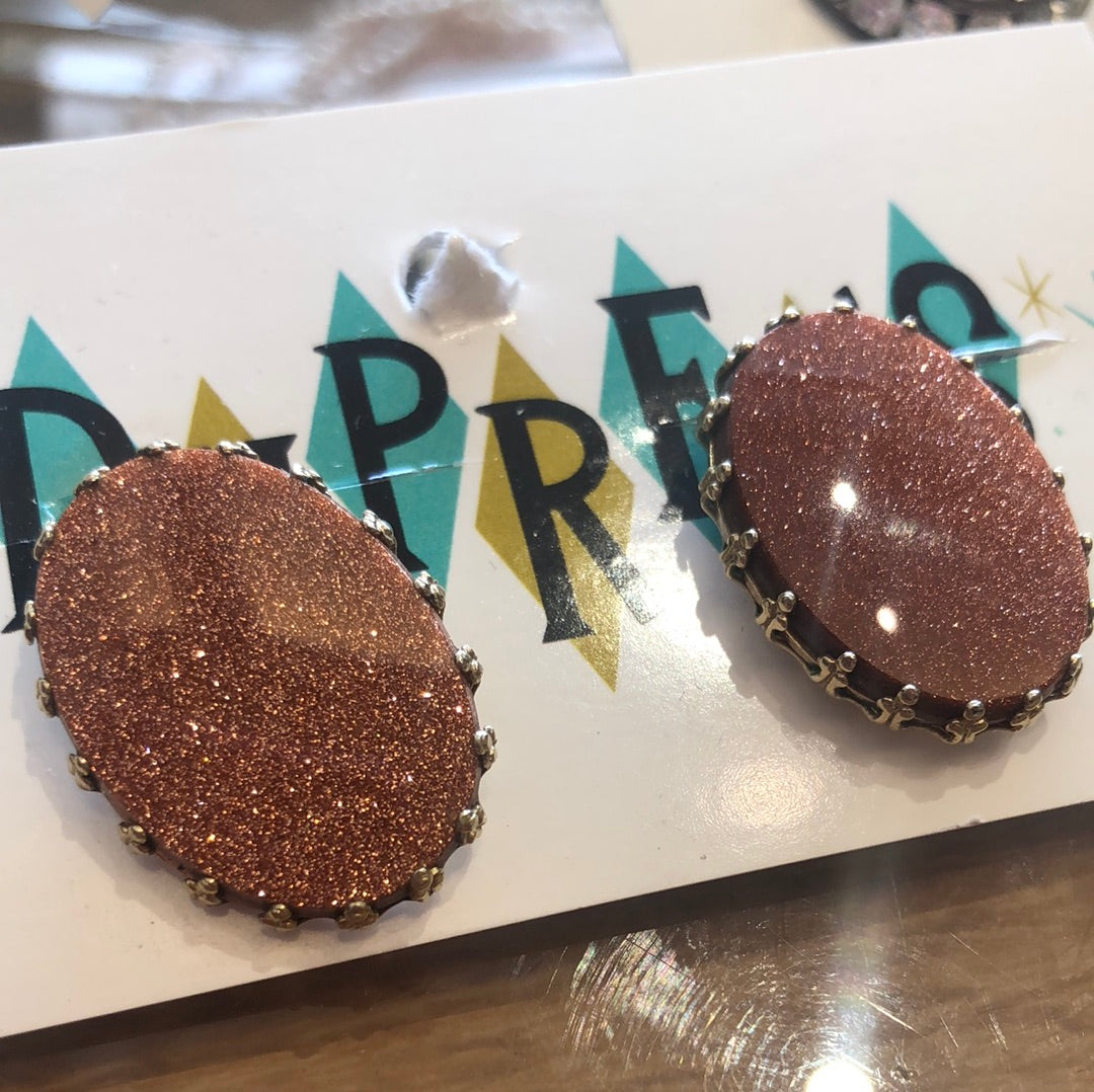 Copper sparkle oval clip on earring