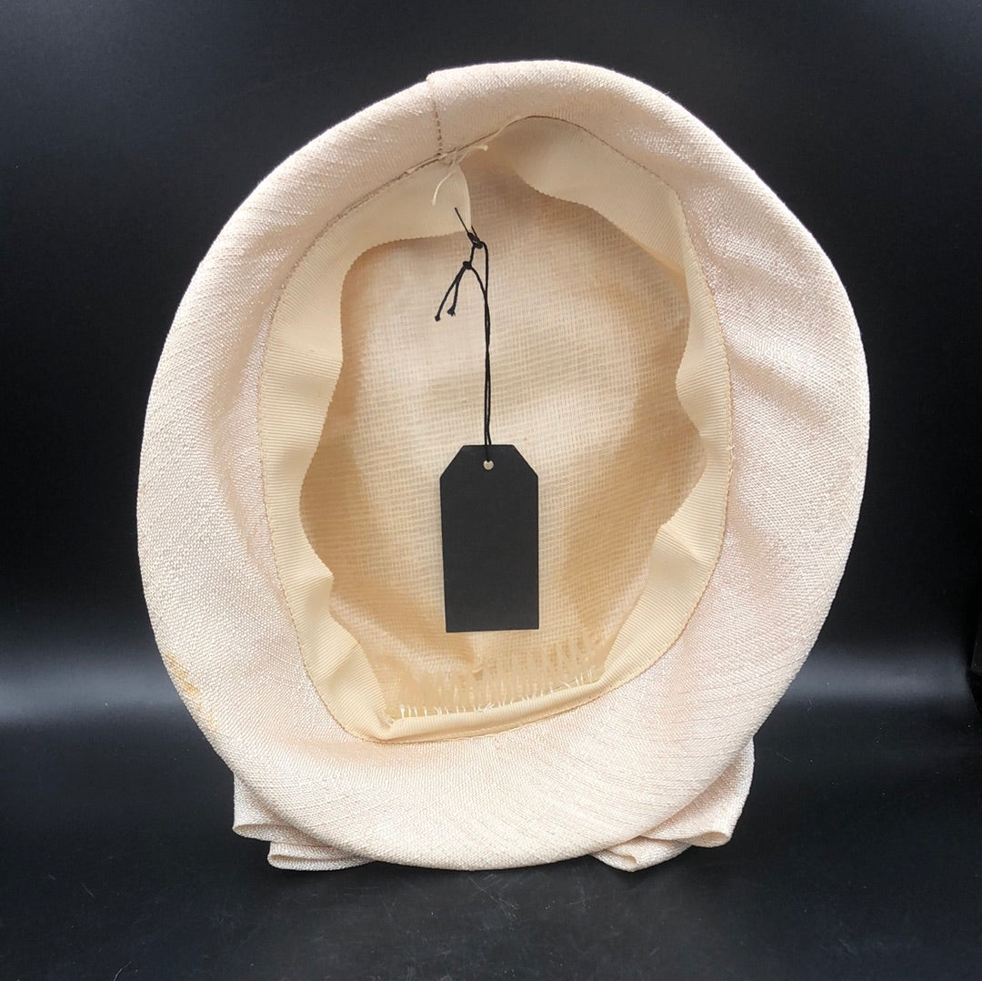 Beige textured fabric hat with bow