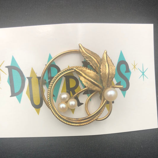 Gold leaf and pearl brooch