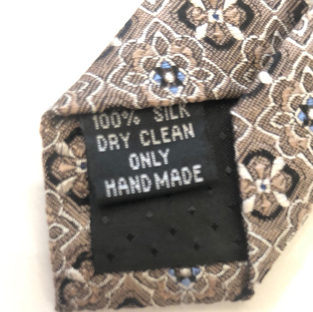 Taupe it with black, white and blue design