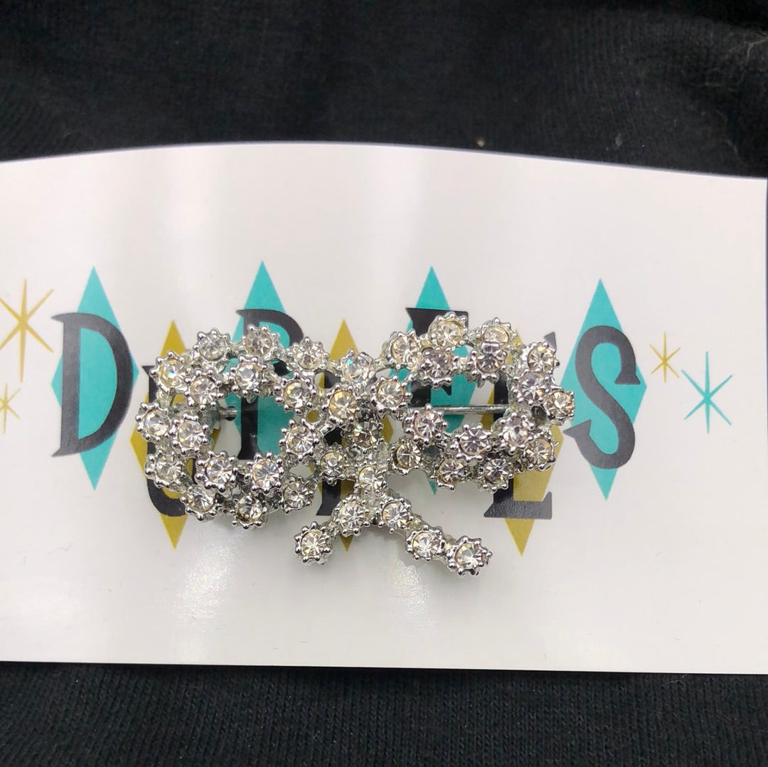 Crystal bow brooch