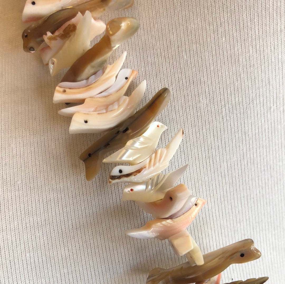 Bird carved Puka Shell necklace