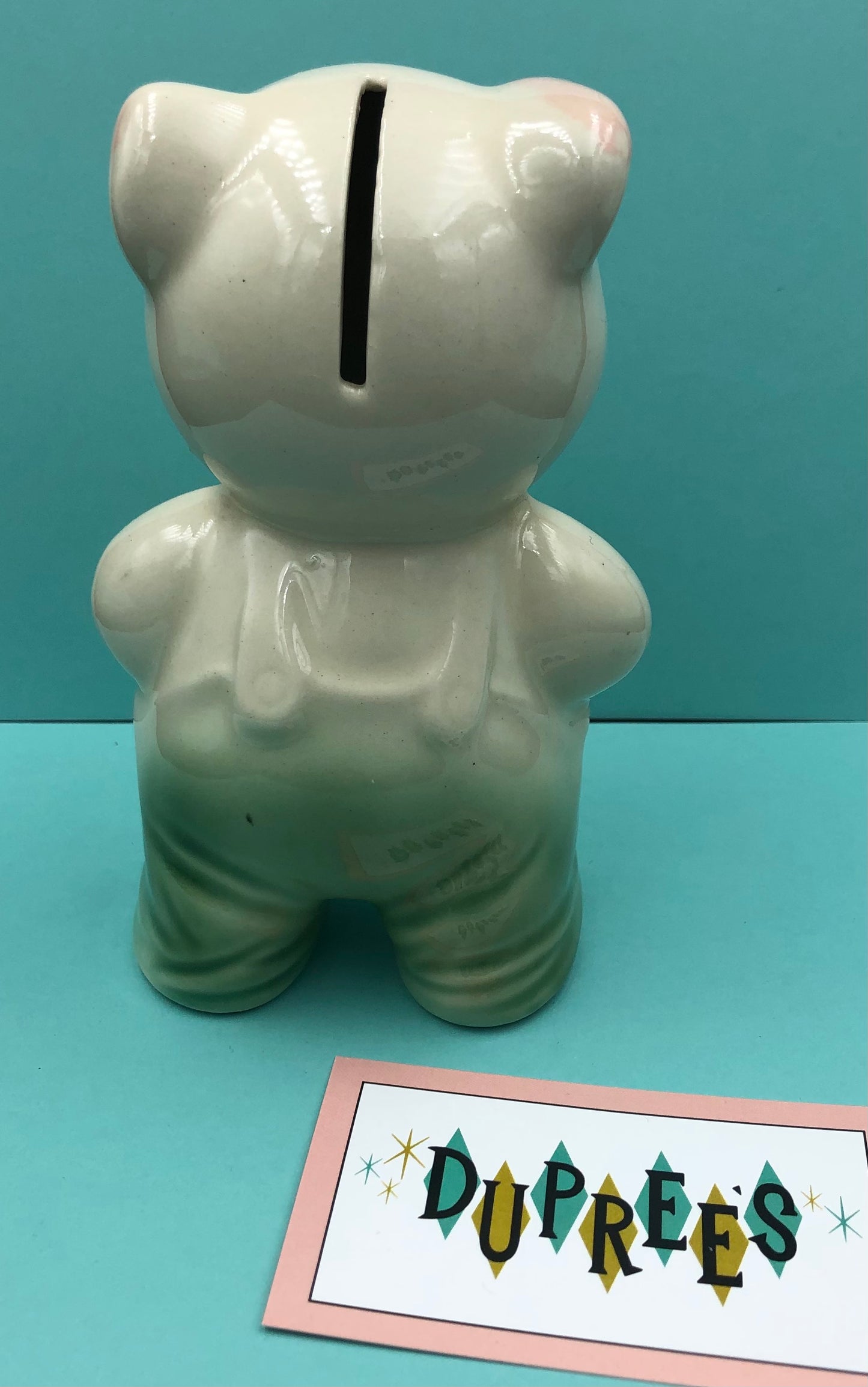Ceramic bashful pig bank