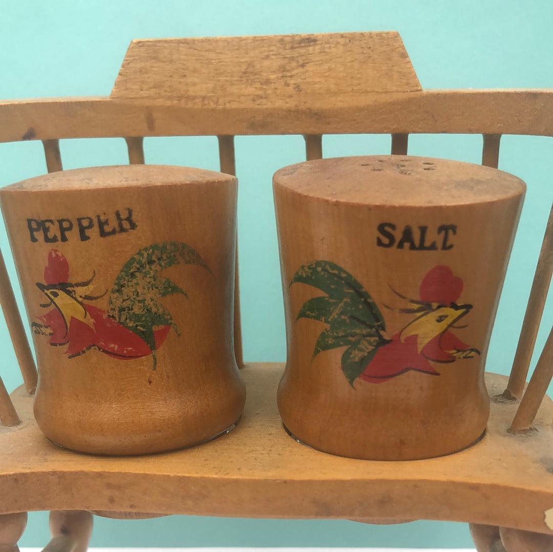 Wooden bench with salt and pepper shakers