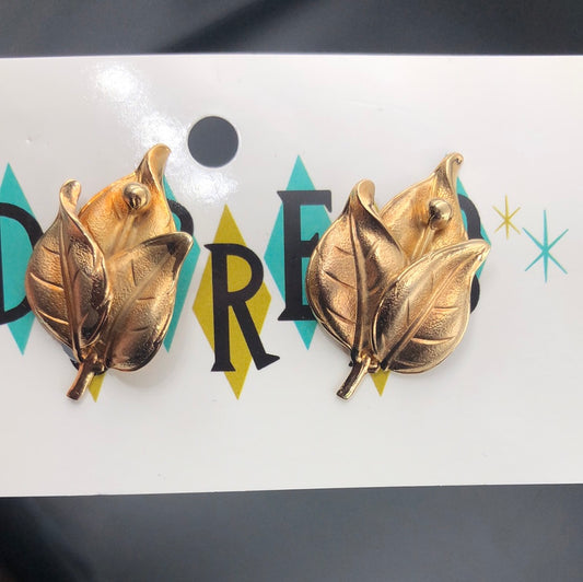 Copper colored leaf bundle clip on earrings